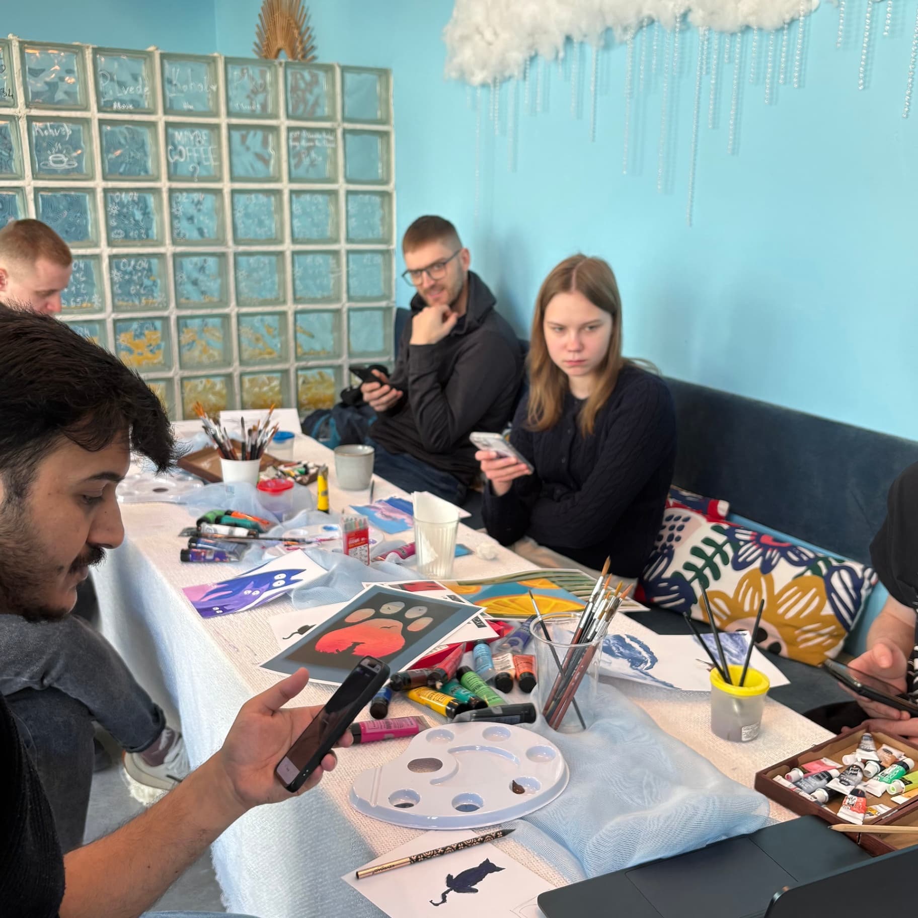 People connecting and laughing at small event playing interactive games